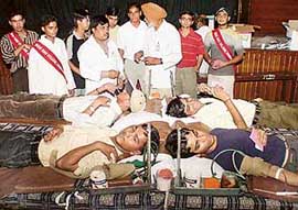 Students take part in a blood donation camp held in DAV College, Sector 10, Chandigarh, on Wednesday.