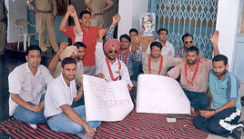 Students block entry to the Vice Chancellor's office at the Punjabi University campus 