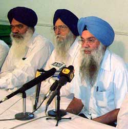 Akali MLA Vir Singh Lopoke addresses mediapersons at Amritsar 