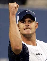 Andy Roddick of the US States celebrates his victory over Tim Henman of Great Britain 