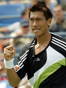 Thailand's Paradorn Srichaphan celebrates his victory over Cyril Saulnier of France