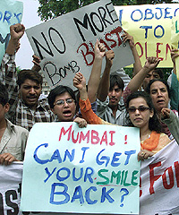 Pakistani peace activists chant anti-terrorism slogans 