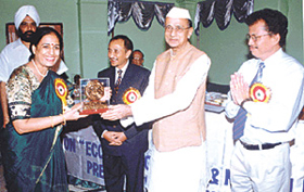 Union Minister of State for Human Resource Sanjay Paswan presenting �Bharat Jyoti Award� to Dr Kamla Bhardwaj at a function in the Capital.