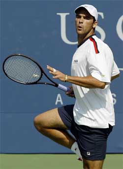 Mark Philippoussis of Australia reacts during his match against Janko Tipsarevic of Serbia
