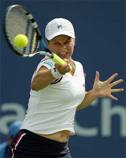 Kim Clijsters of Belgium hits a return to Laura Granville of the US