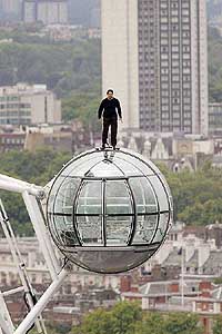 US magician David Blaine stands on the London Eye