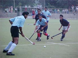 A hockey match between the Speed Fund Academy, Ludhiana, and the Surjit Academy, Jalandhar, in progress