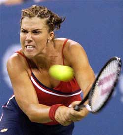 Jennifer Capriati of the US hits a backhand return to Martina Sucha of Slovakia