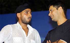 Indian cricketer Harbhajan Singh and Punjabi pop singer Jassi share a light moment 