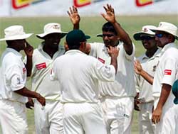 Bangladeshi players celebrate the dismissal of Pakistani batsman Inzamamul Haq 