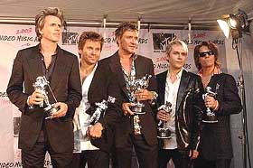 Duran Duran pose after receiving the Lifetime Achievement Award during the MTV Video Music Awards