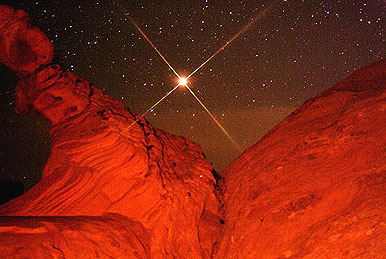 Mars is shown in this image taken on Wednesday with the Arch Rock formation in foreground