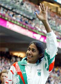 India's Anju Bobby George waves after winning the bronze medal in the women's long jump final 