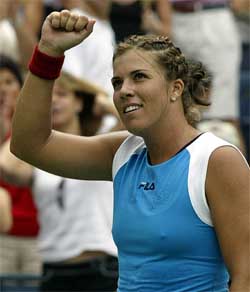 Jennifer Capriati of the US celebrates her 6-2, 2-6, 6-2 victory over Emelie Loit of France