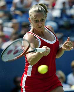 Mary Pierce of France hits a return to Shinobu Asagoe of Japan