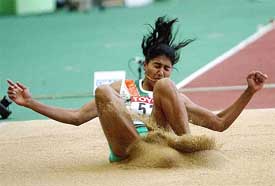 Anju Bobby George competes in the long jump final