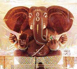 A 11-foot high Ganesh idol, made of 15,000 chocolate cubes and 15,000 Gems chocolate tablets at Tulsi Building in South Mumbai