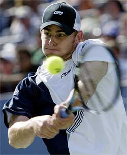 Andy Roddick of the US hits a return to Flavio Saretta of Brazil