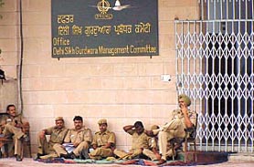 Delhi police personnel keeping vigil outside the DSGMC office.
