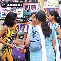 Students discussing political issues on the eve of DUSU polls.