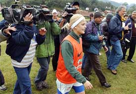 Soccer player Milena Domingues, wife of Brazilian soccer star Ronaldo, walks towards the field where the men's national soccer team practices 