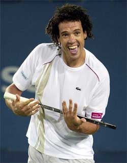 Younes El Aynaoui of Morocco cradles his racquet