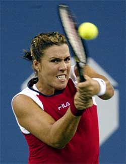 Jennifer Capriati of the US hits a return to Francesca Schiavone