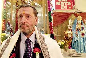 Britain�s Home Secretary David Blunkett wears a ceremonial tilak on his forehead during his visit to the Shri Ram Mandir in Southall