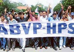 Members of the Akhil Bharatiya Vidyarthi Parishad take out a procession with the Himachal Pradesh Students Union after announcing an alliance for the forthcoming elections 