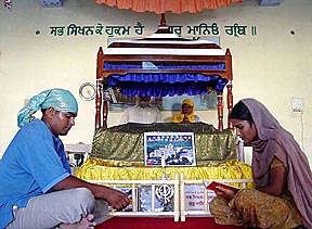 Balwinder Singh and Balwinder Kaur praying for the early release of their brother Sukhwinder Singh from Pakistani prison