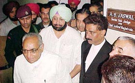 Punjab Chief Minister Amarinder Singh and Mr Motilal Vora at a court in Shimla
