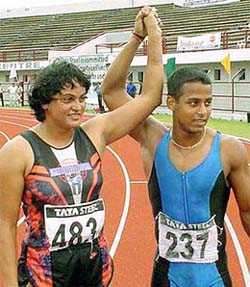 Gold medal winners in men's and women 100 metres, Sanjay Ghosh of West Bengal and Poonam Tomar of Delhi