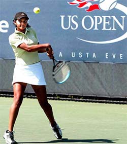 India's Sania Mirza makes a backhand return against Laine Emma of Finland 