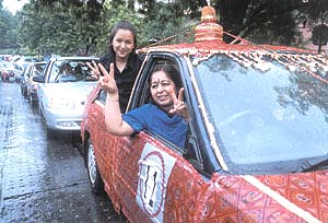 RARING TO GO: Some of the participants during the 3rd Family Car Rally 2003 in the Capital on Sunday