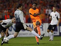 Patrick Kluivert of the Netherlands scores a goal against Austria