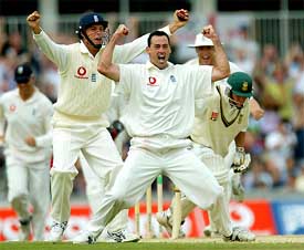 England's Martin Bicknell celebrates the dismissal of South African captain Graeme Smith