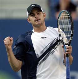 Andy Roddick of the US celebrates a point against David Nalbandian of Argentina
