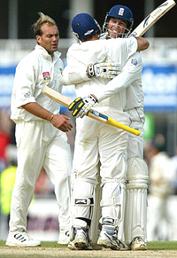 England batsmen Marcus Trescothick and Mark Butcher hug each other after England won the fifth Test match at the Oval 
