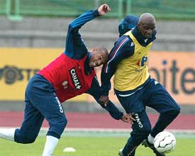 Thierry Henry and Patrick Vieira of France practice prior to their Euro 2004 qualifier against Slovenia 