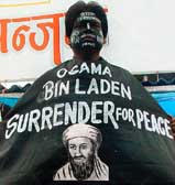 A member of the Mahatma Gandhi Global Council for World Peace and Amity dresses in black while protesting against terrorism