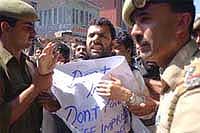 The police arrest JKLF vice-chairman Javid Mir, who was leading a protest march against the life imprisonment to 10 Pakistan-trained militants, in Srinagar