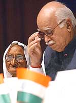 Deputy Prime Minister L.K. Advani with Rasoolan Bibi, widow of Abdul Hamid, at a function to mark Anti-Terrorism Day and martyrdom of Abdul Hamid, in New Delhi