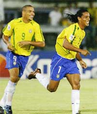 Brazil's Ronaldinho celebrates his goal during the 2006 World Cup qualifier match against Ecuador