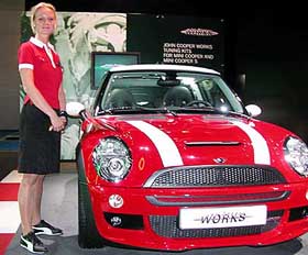 A model poses with Mini Cooper's 'Works' small car