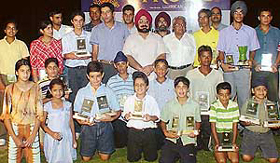 Prize winners amidst Mr S.S. Bedi, Chief Commissioner, Customs and Central Excise, during a function of the Chandigarh Golf Championship on Saturday. 