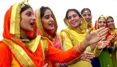Students of Guru Nanak Girls College make merry during the old students meet on the campus