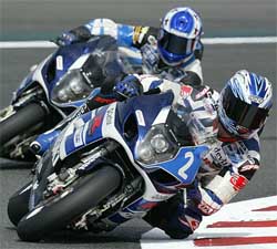 Sebastien Gimbert of France leads Brian Morisson on his Suzuku GSXR bike 