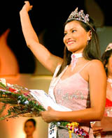Priti Sitoula waves to the crowd after being crowned Miss Nepal in Kathmandu 