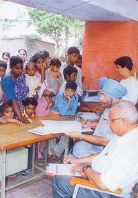 Patients being registered at a medical camp organised by the Rotary Chandigarh Shivalik at Kajheri village on Sunday.