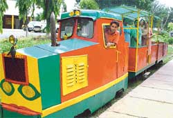 City residents having a �nice time� in the toy train at Indira Holiday Home